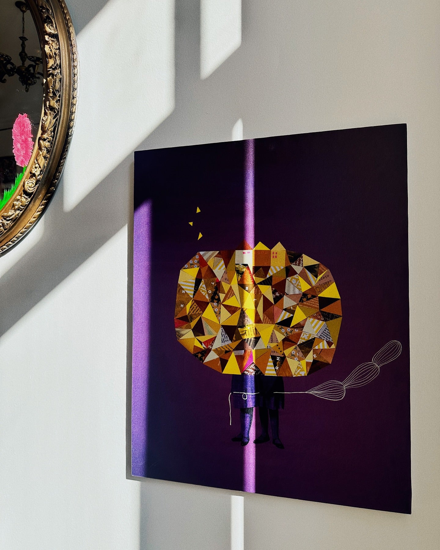 Close-up of abstract yellow-purple bloom illustration on canvas