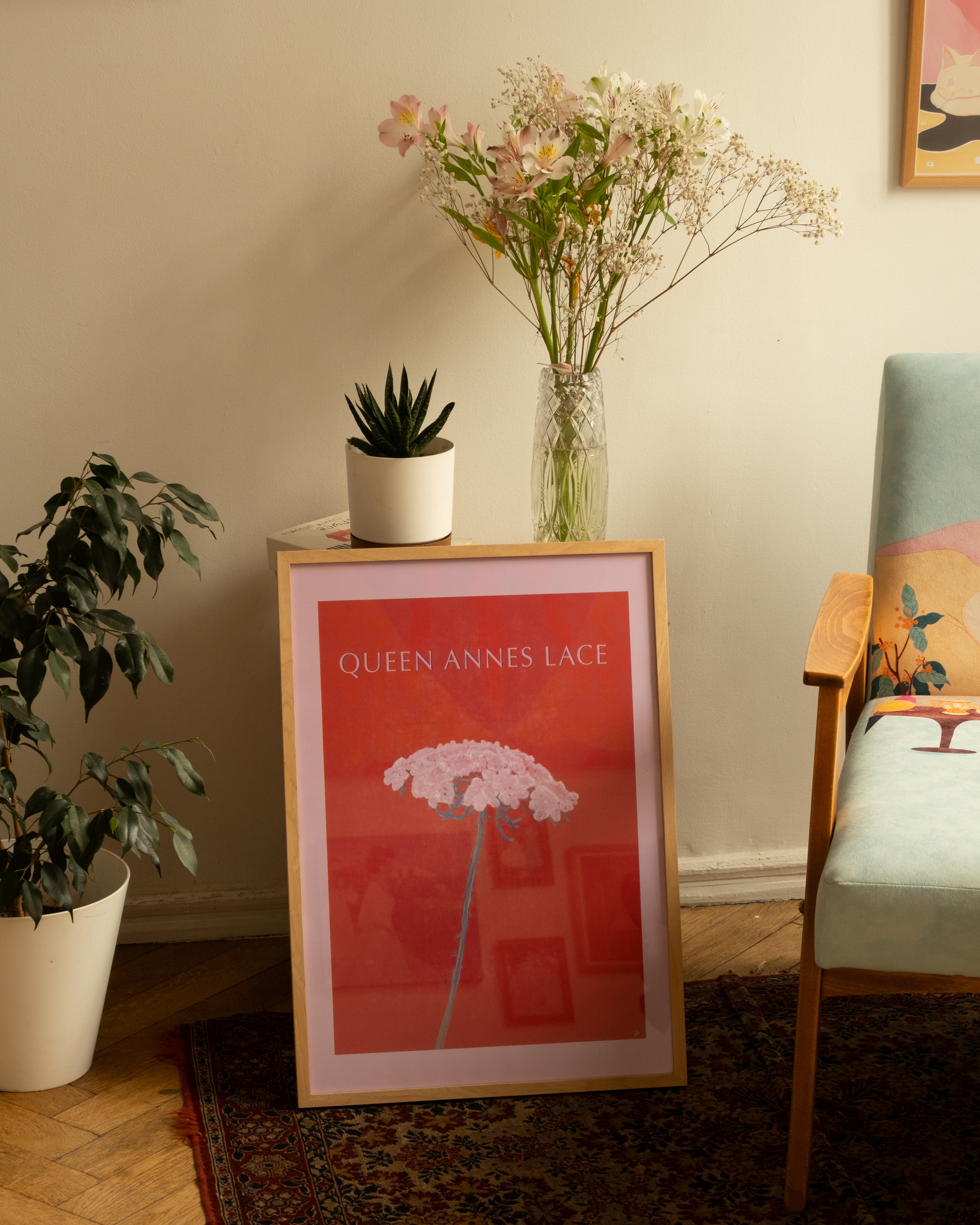 “Queen Anne’s Lace” poster by Anano Kevanishvili featuring a delicate pink flower on a deep red background