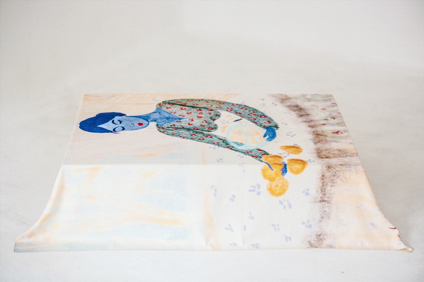Tablecloth “Woman” by Anano Kevanishvili, sublimation-printed fabric with vibrant illustration, DAE home décor. White Background, Blue Woman with Lemons