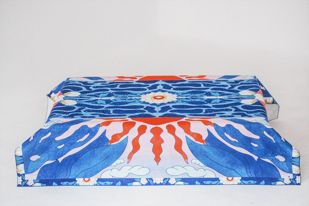 Full view of Moon tablecloth styled on a table – DAE artist-designed textile