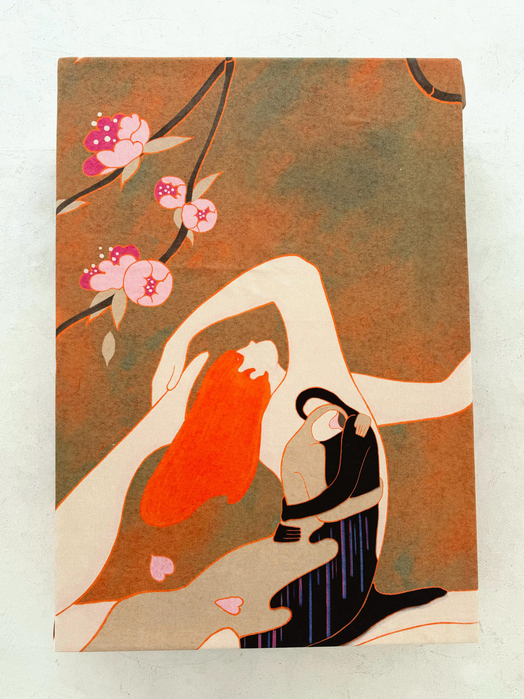 DAE tablecloth featuring Leah Han’s expressive illustration displayed on a dining table.