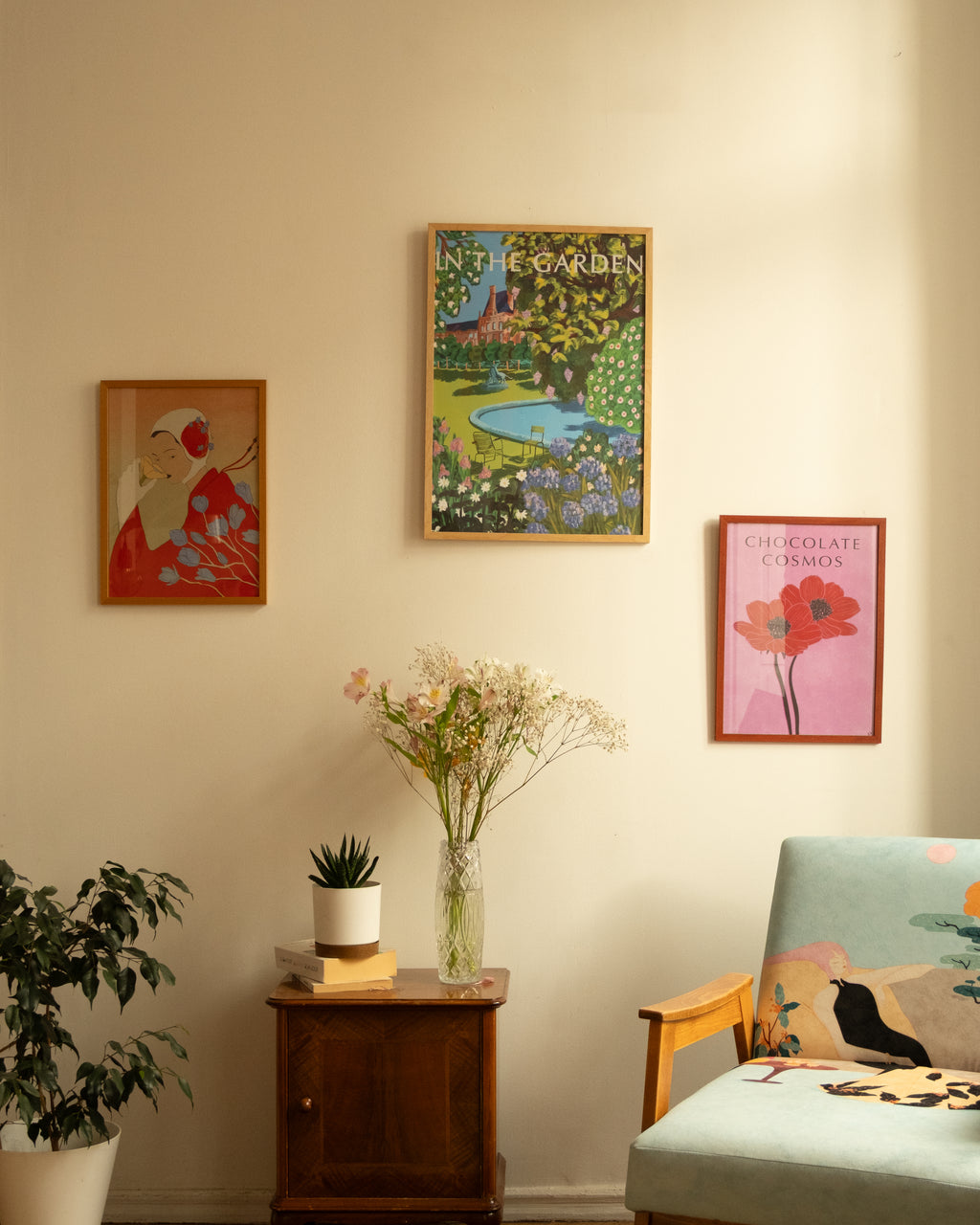 Contemporary floral wall art from the “100 Flowers” series by Georgian artist Anano Kevanishvili - next to other posters by DAE, in interior
