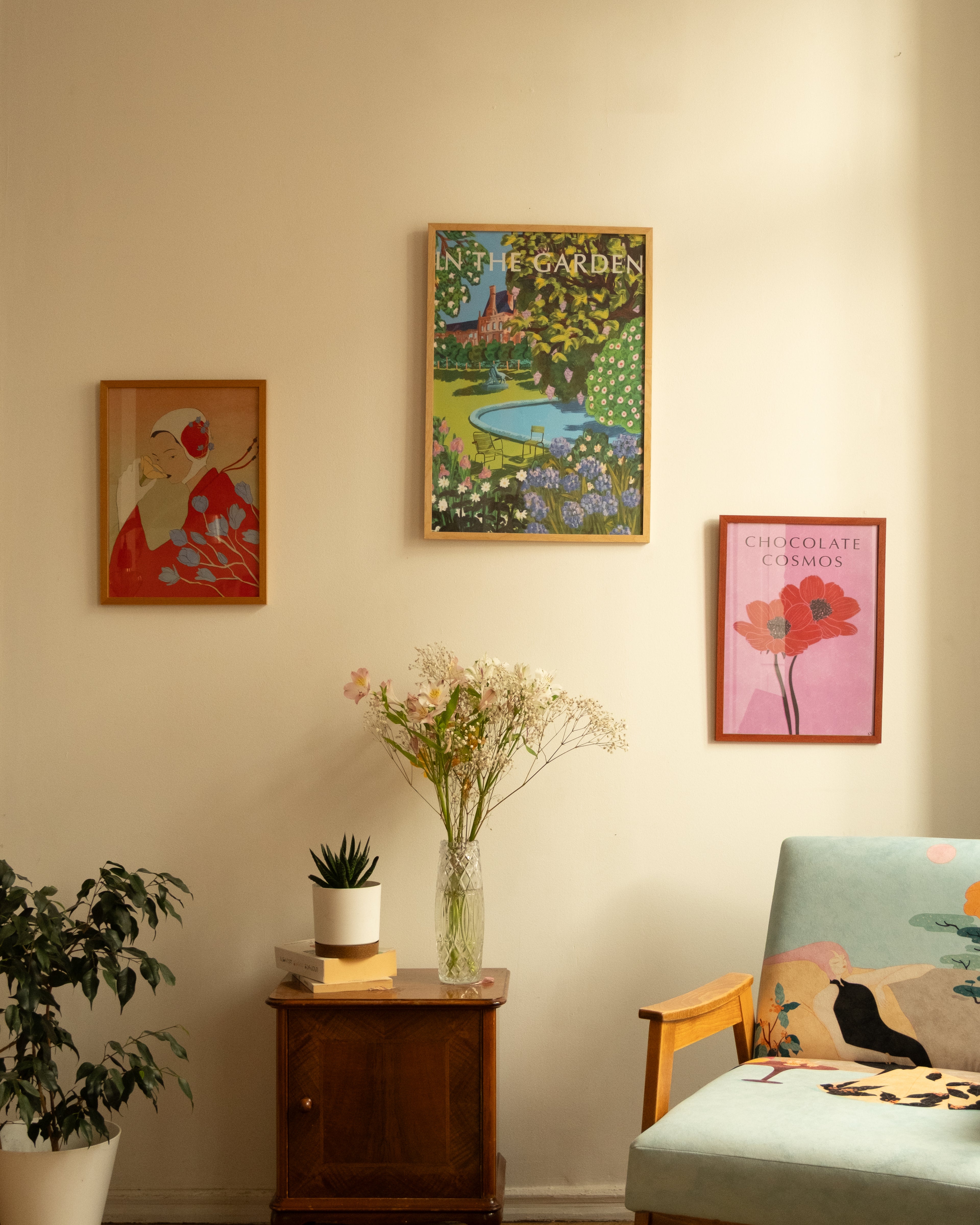 Contemporary floral wall art from the “100 Flowers” series by Georgian artist Anano Kevanishvili - next to other posters by DAE, in interior