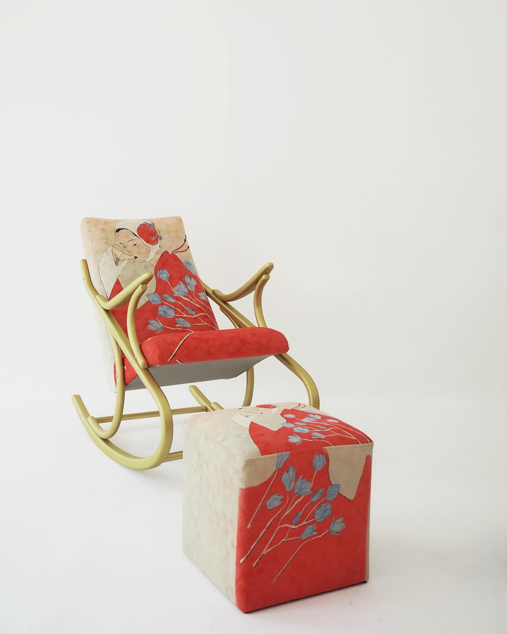 Rocking chair and matching ottoman on a white background, by DAE