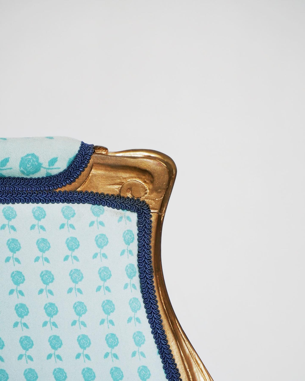 Chair with floral-patterned background