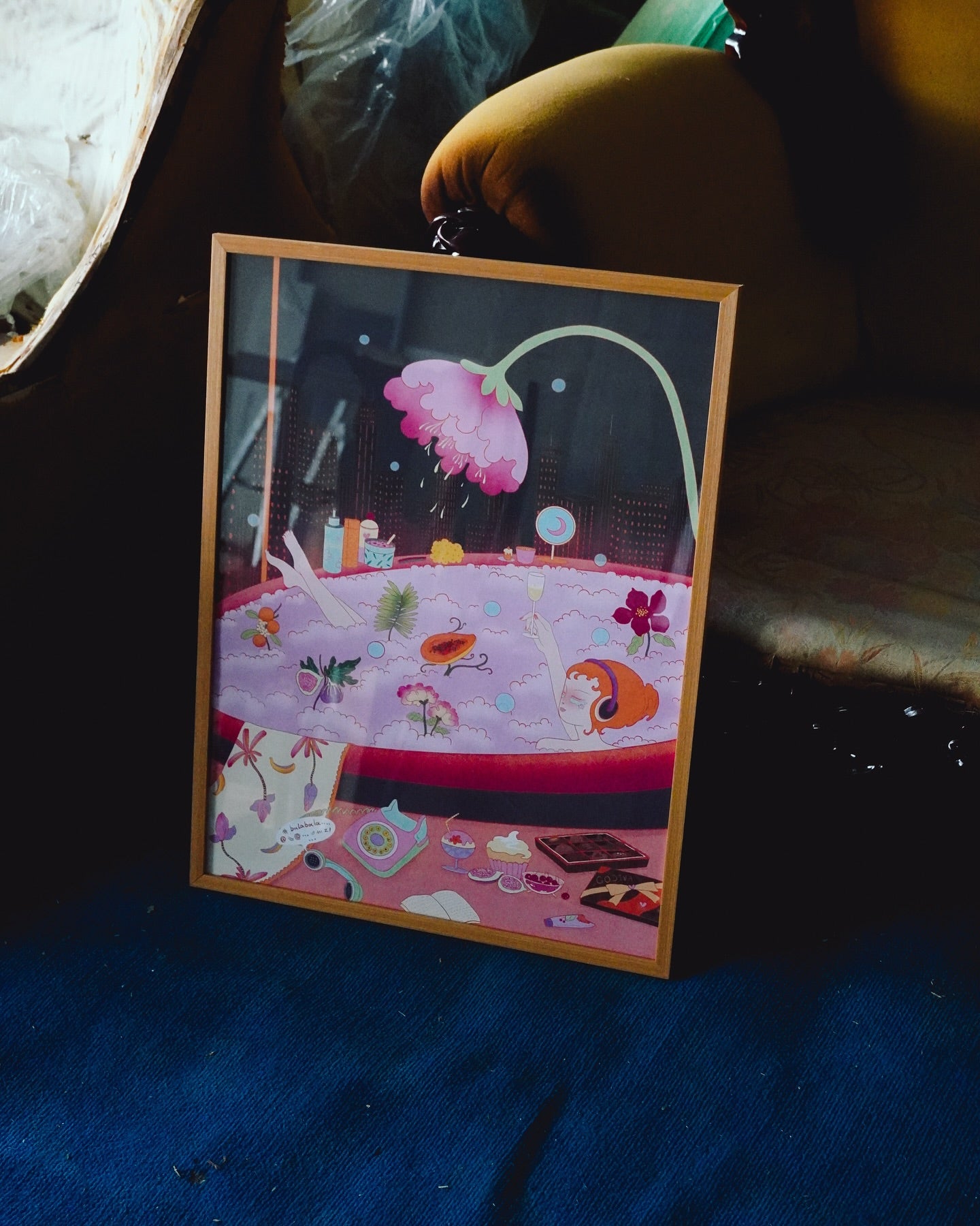girl laying in bath, drinking cocktail, listening to music, big flower above her, view of city poster standing on the floor