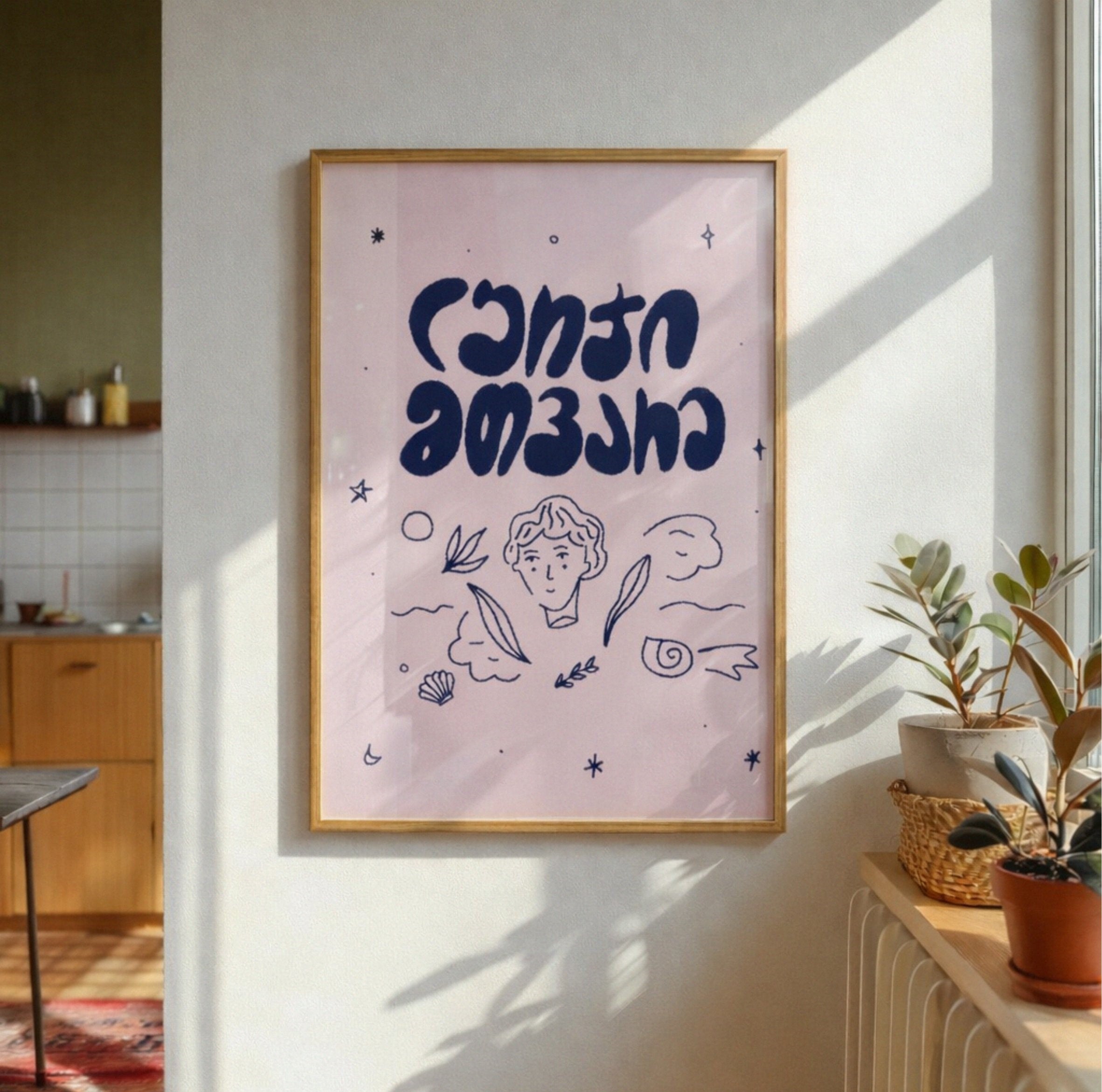 Framed artwork with abstract design on a wall in a bright room