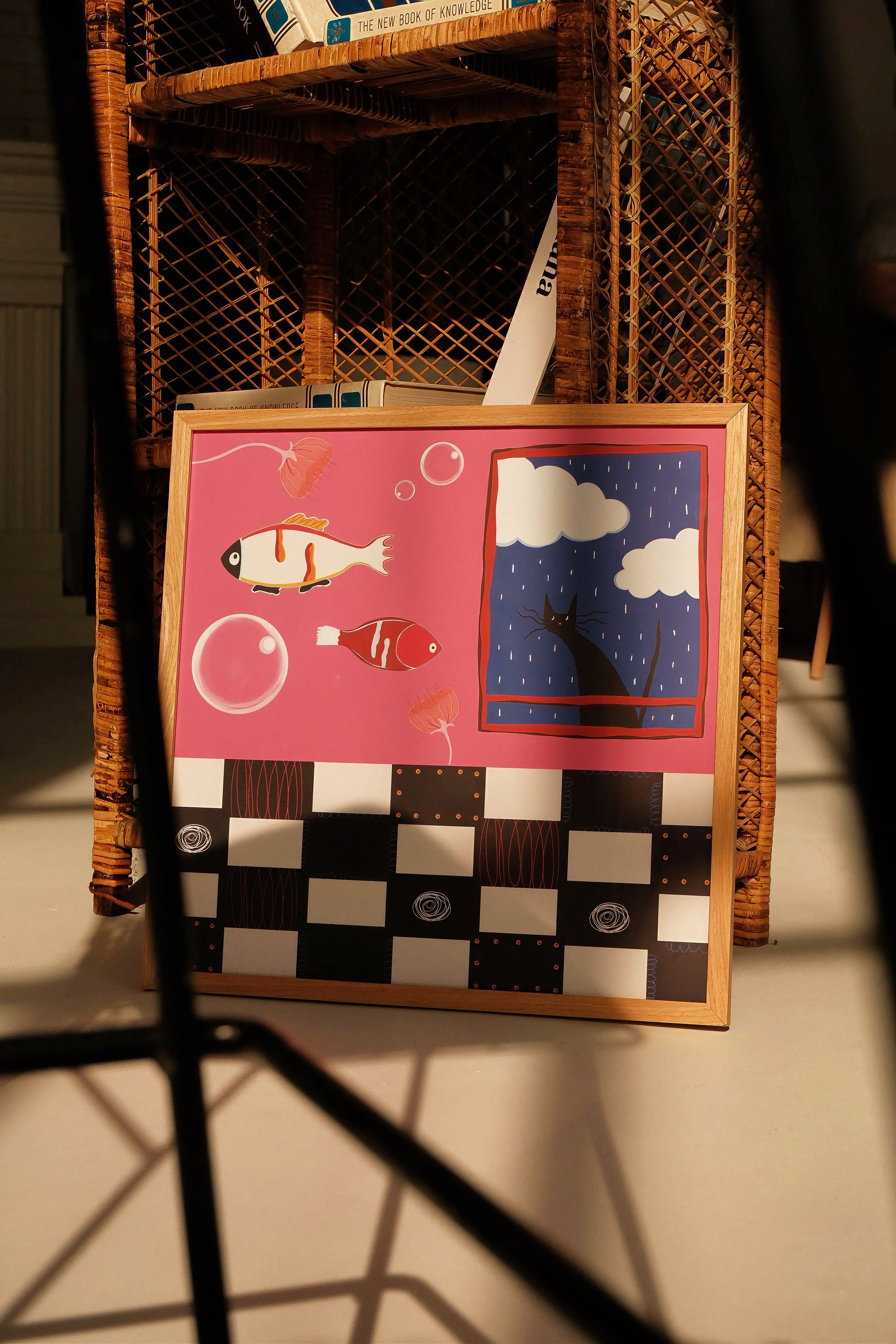 Surreal illustration poster with black cat, floating fish, bubbles and rainy window in pink tones by Tekle Ghvania