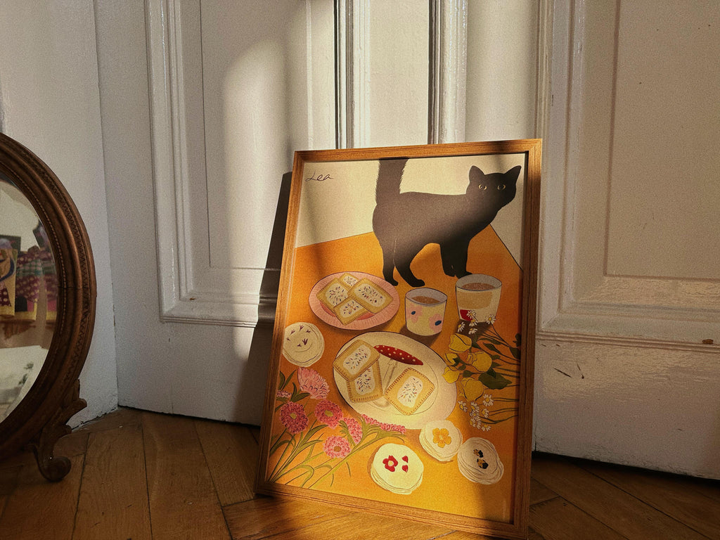 poster on the floor with design of cat, flowers, swets and tea