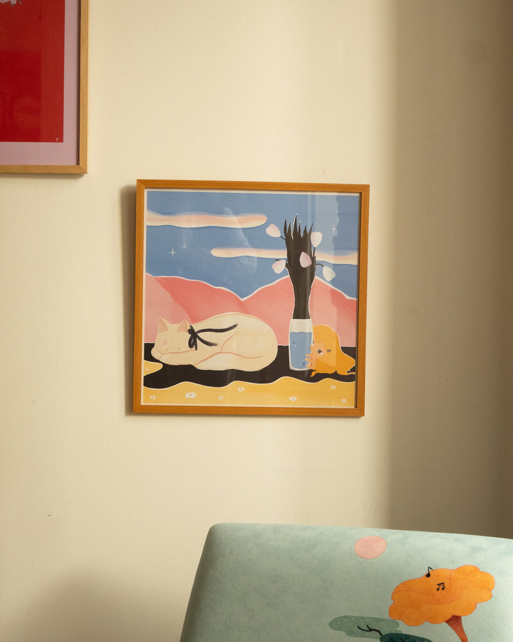 poster above the armchair by DAE