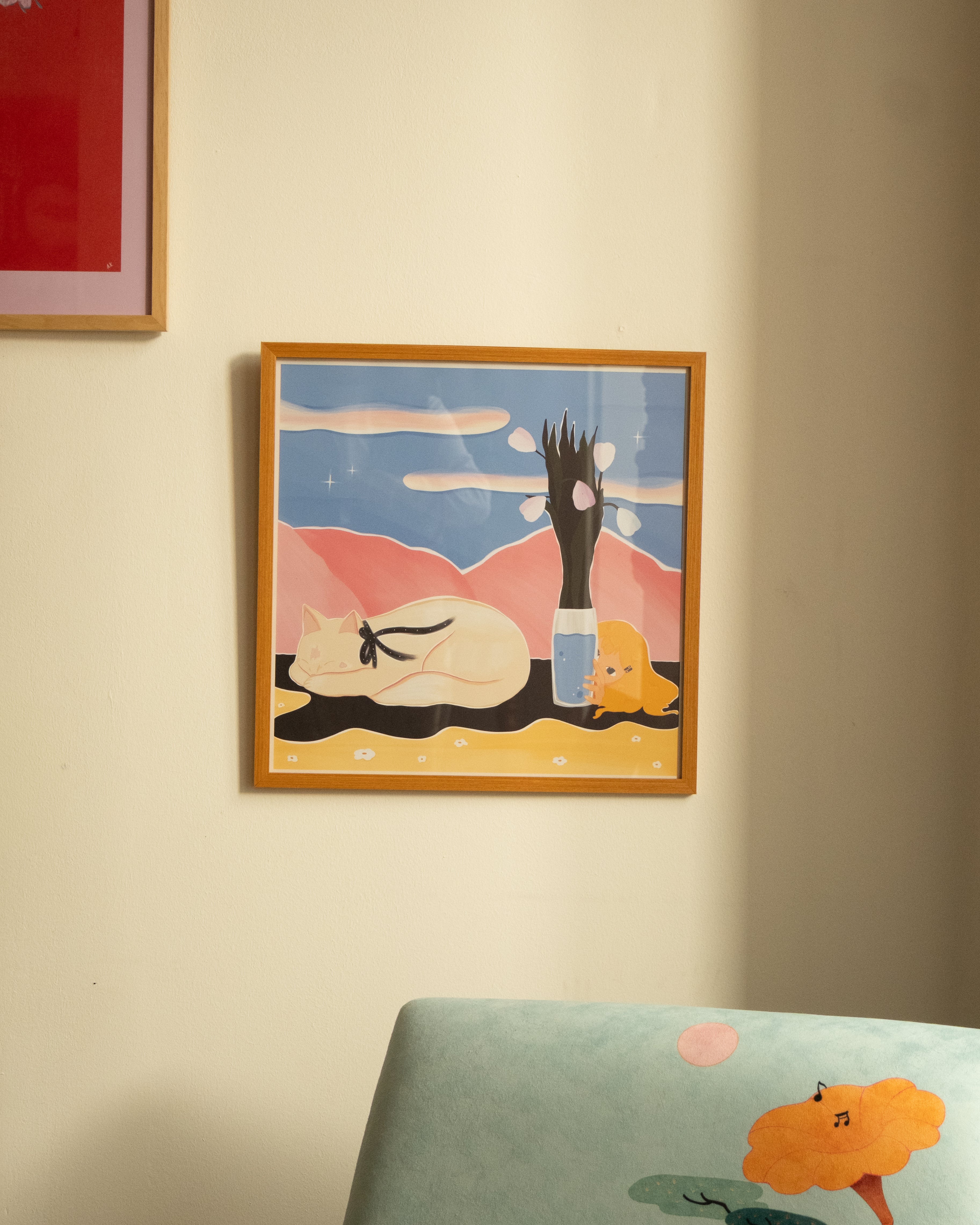 poster above the armchair by DAE