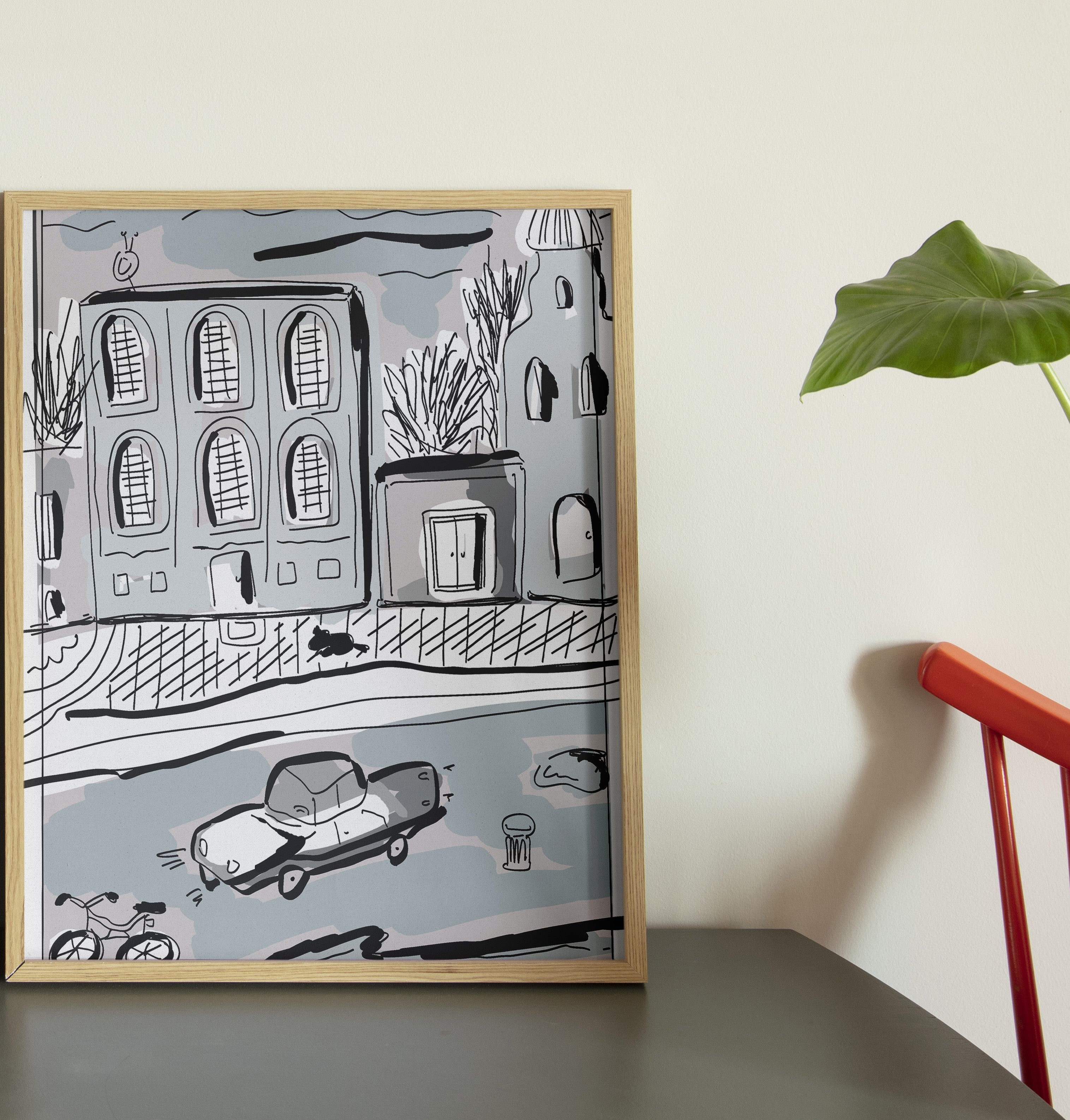 A framed poster by DAE depicting a stylized, minimalistic illustration. Close-up of the “90s Tbilisi Street” minimalist line illustration by Oliko Tkebuchava.
