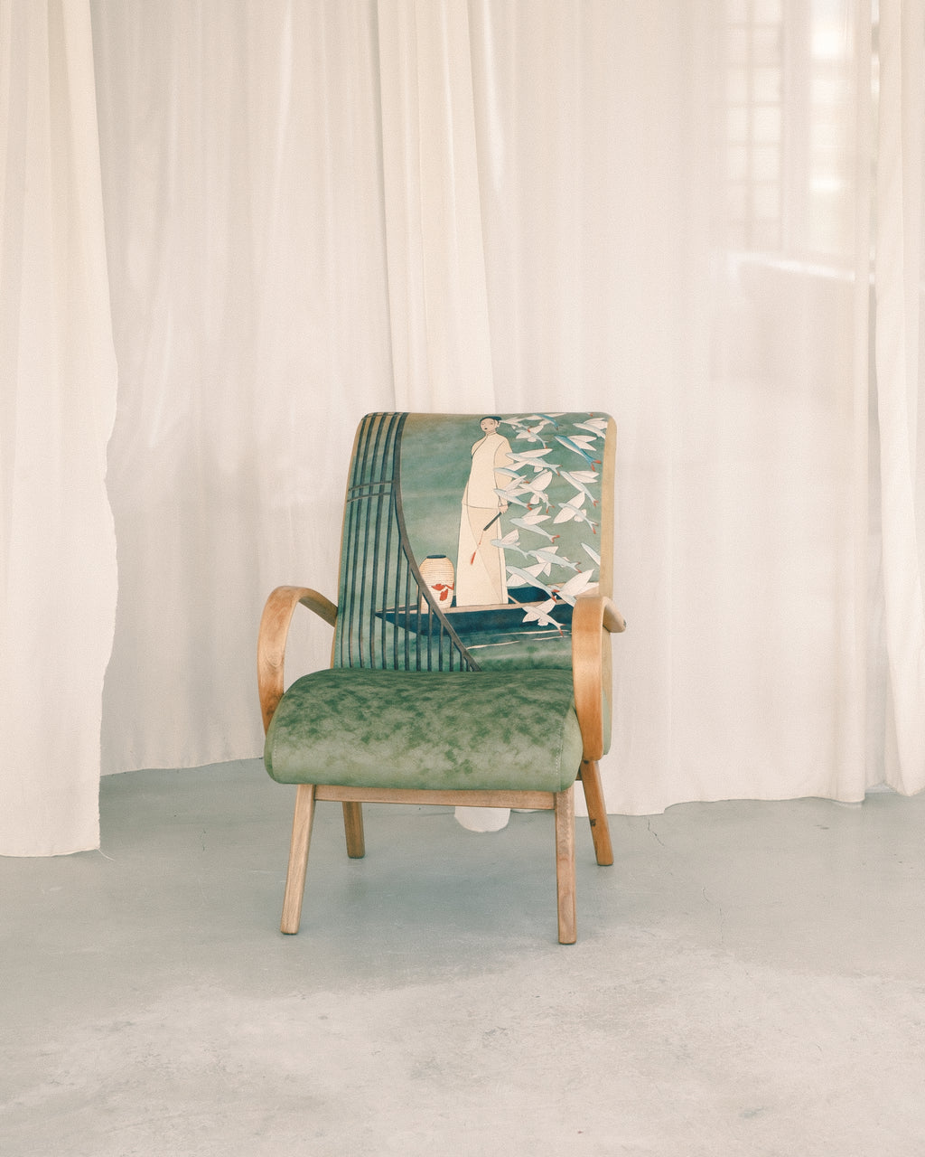 armchair made by DAE standing in white studio