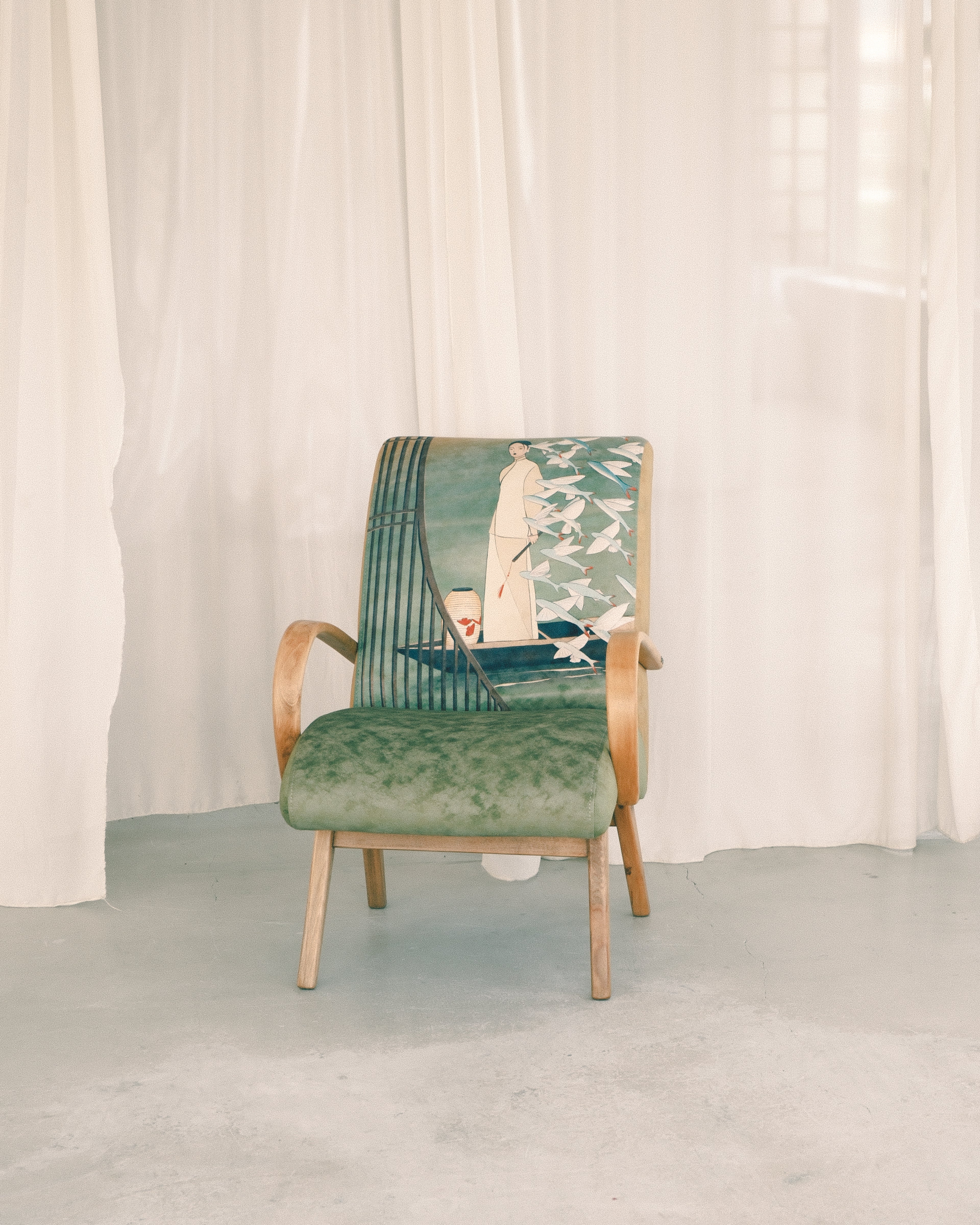 armchair made by DAE standing in white studio