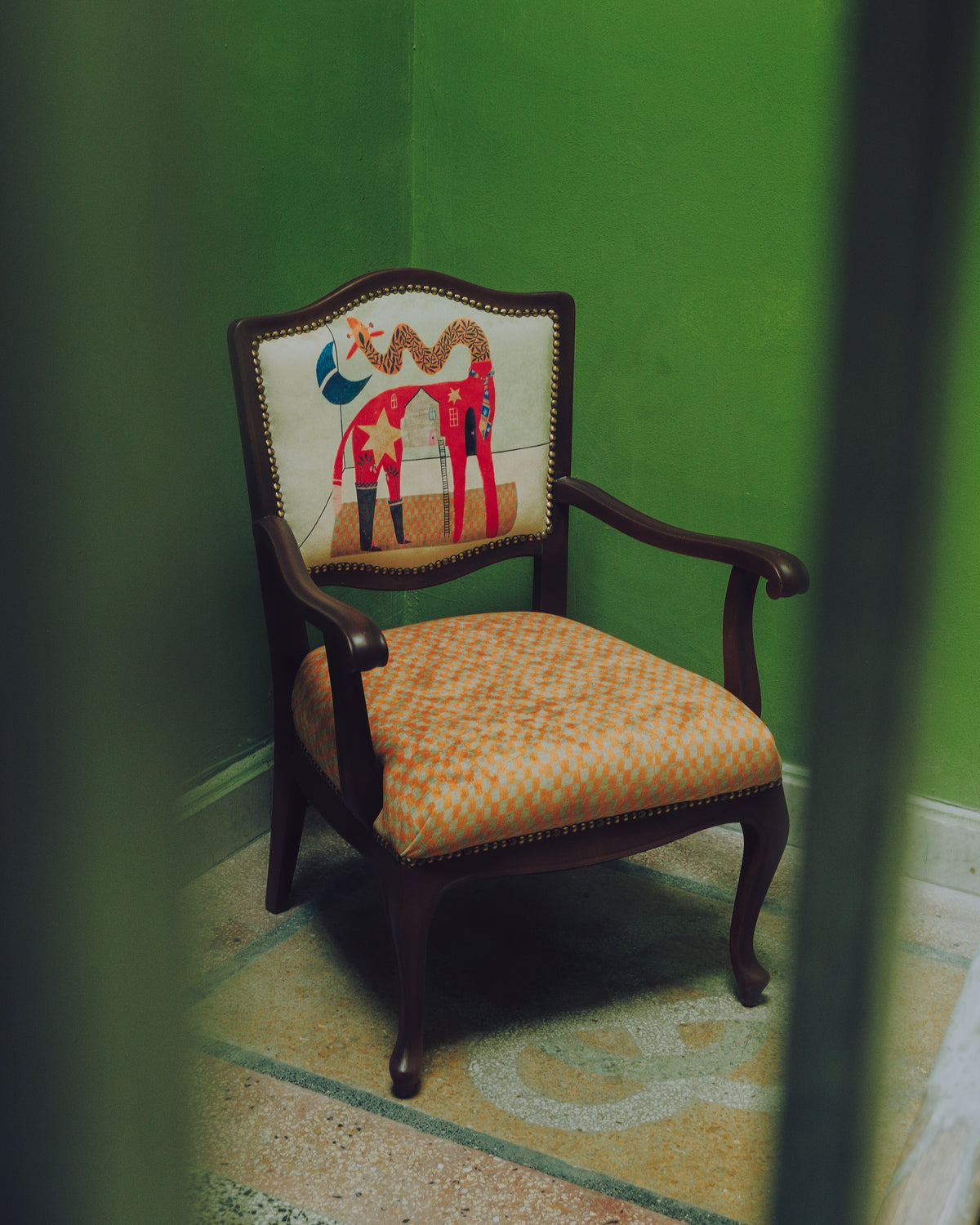 A Taller Tale – One-of-a-kind restored vintage armchair by DAE, featuring Feli Beringer’s Tall Dreams illustration, Alcantara upholstery, and a dark wooden frame.