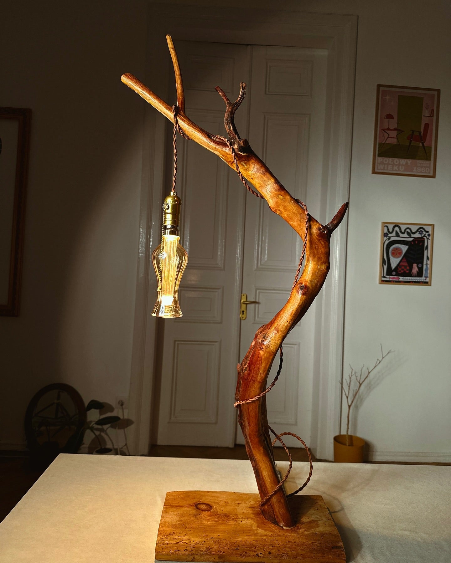 handmade wooden lamp standing on the table
