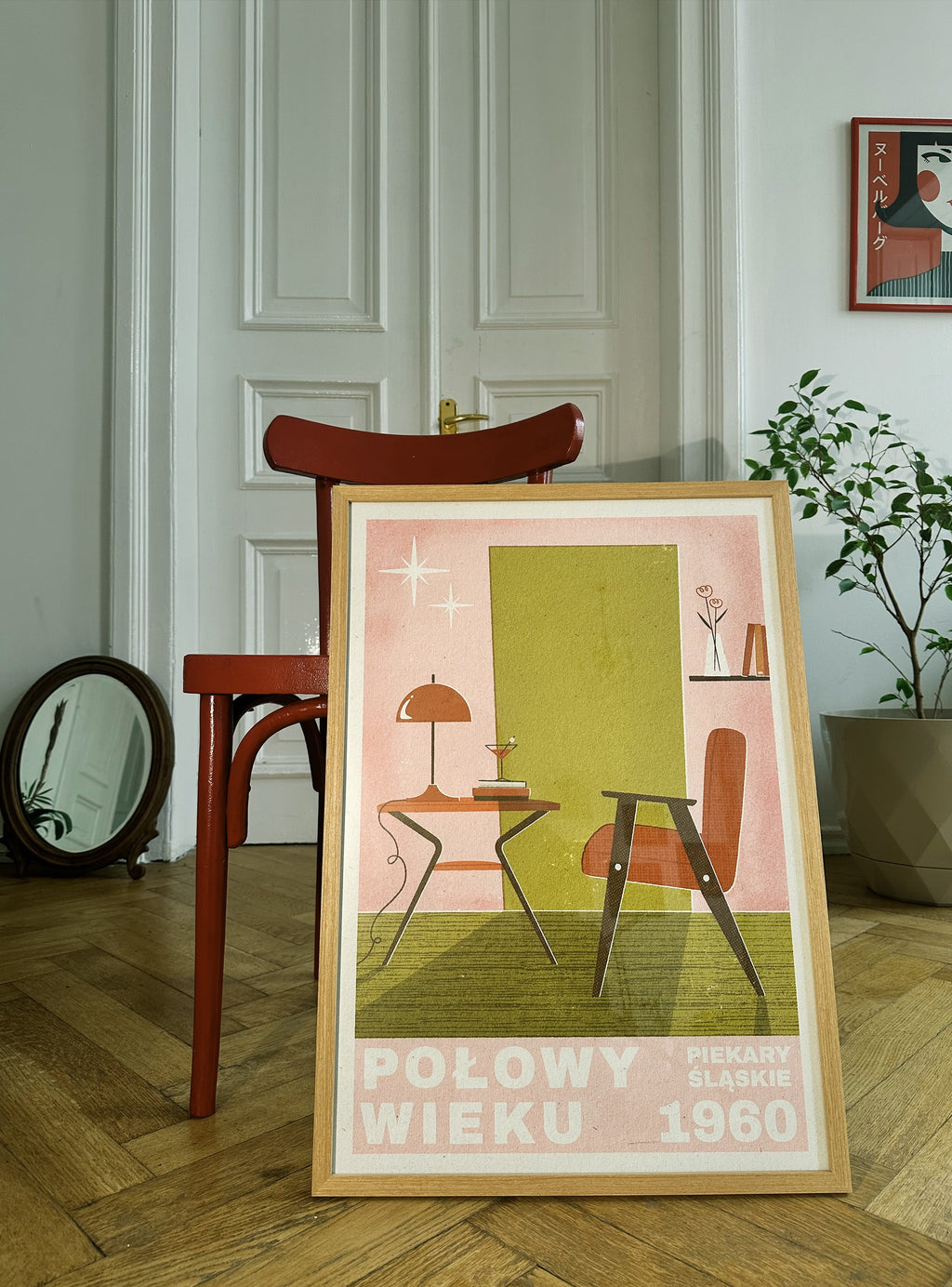 A vintage style poster featuring mid-century furniture and decor, with a table, chairs, and a mirror, set against a white background.