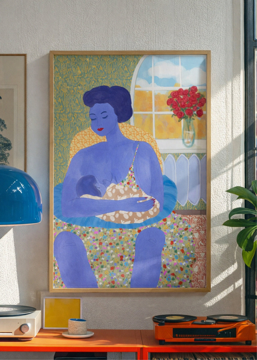 Colorful poster of a woman in a frame on a wall with a retro console below.