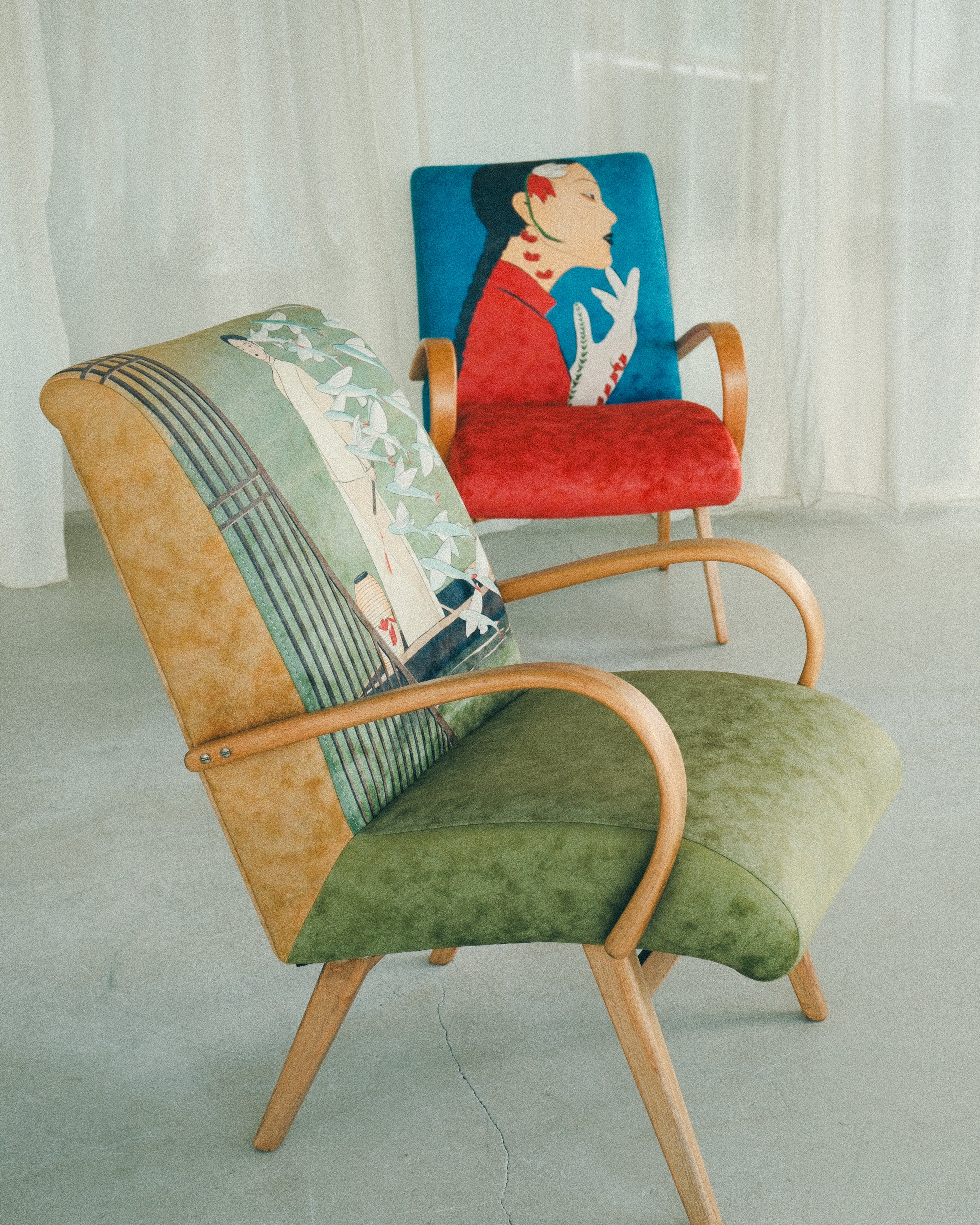 two armchairs by lea wo standing in studio