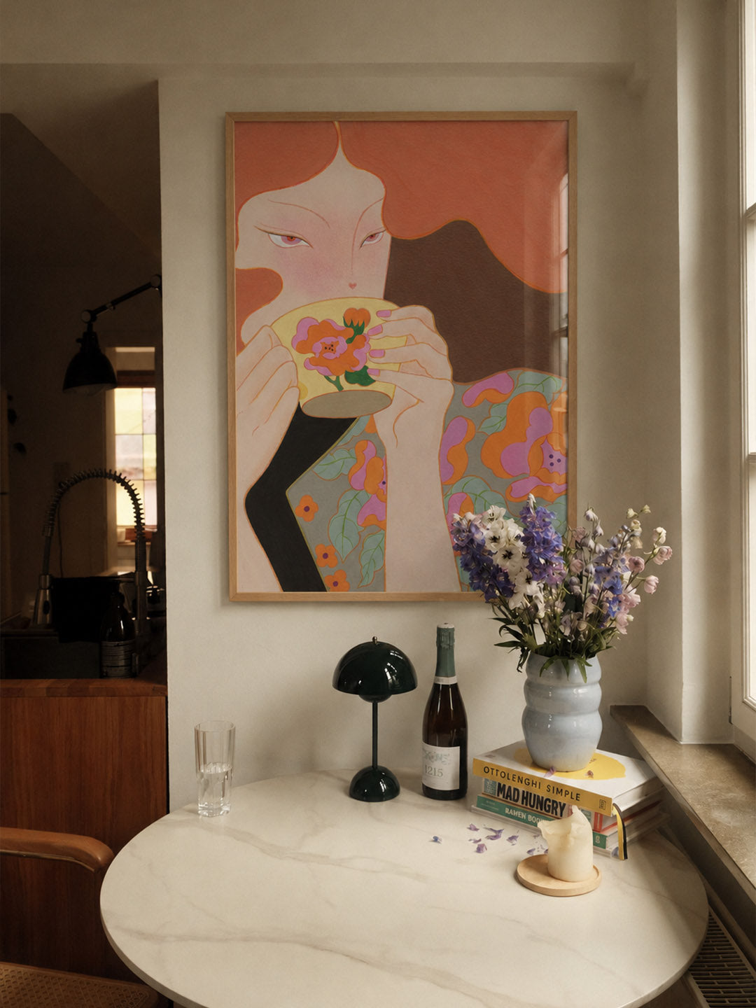 poster hanging in dining space made by DAE