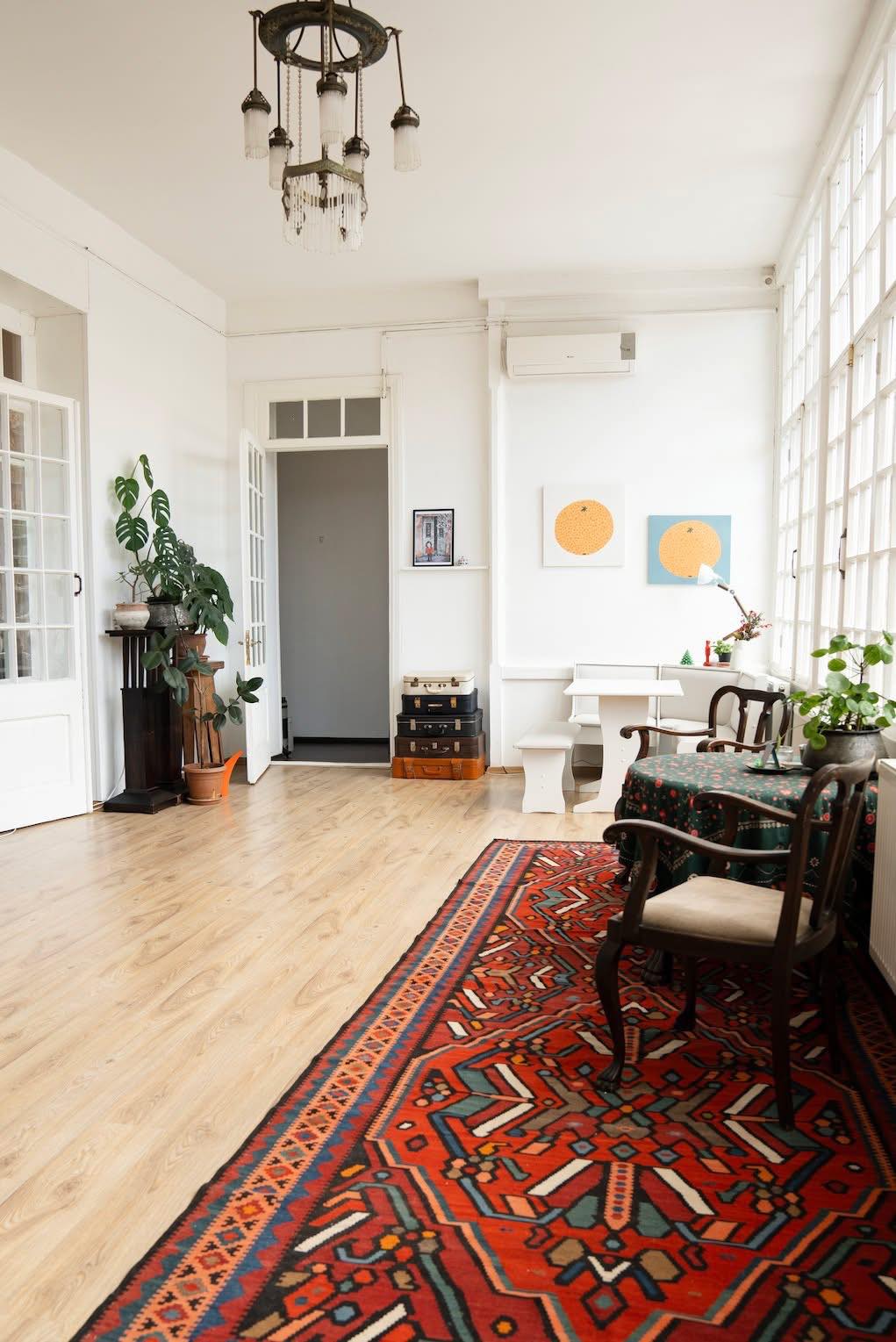 Framed “Orange” poster by DAE • დაე displayed in modern interior with warm light.