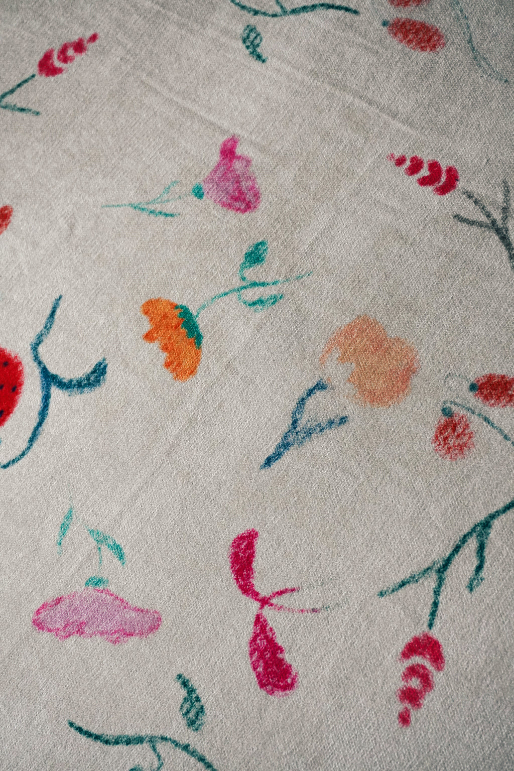 Close-up of the “Muted Garden” design showing delicate botanical details.