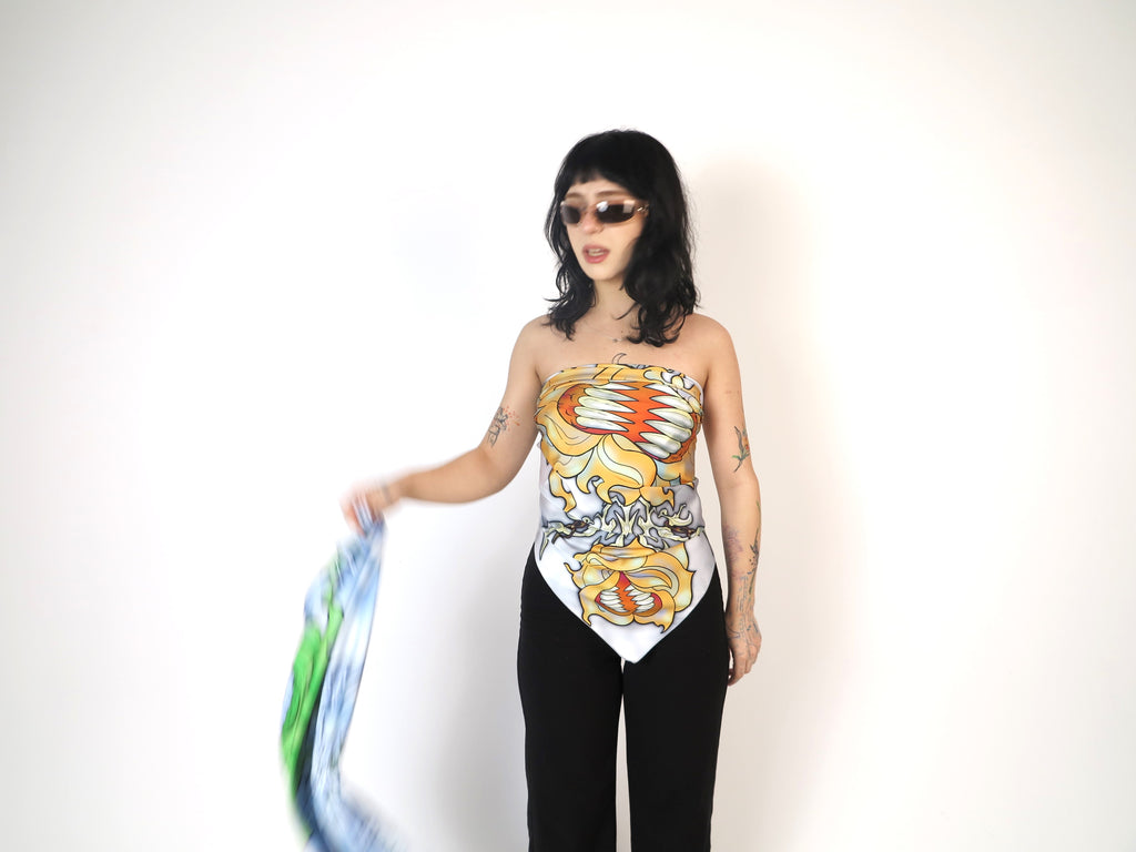 PetalPixie Citrus Bloom scarf styled as a top, featuring vibrant floral abstract illustration