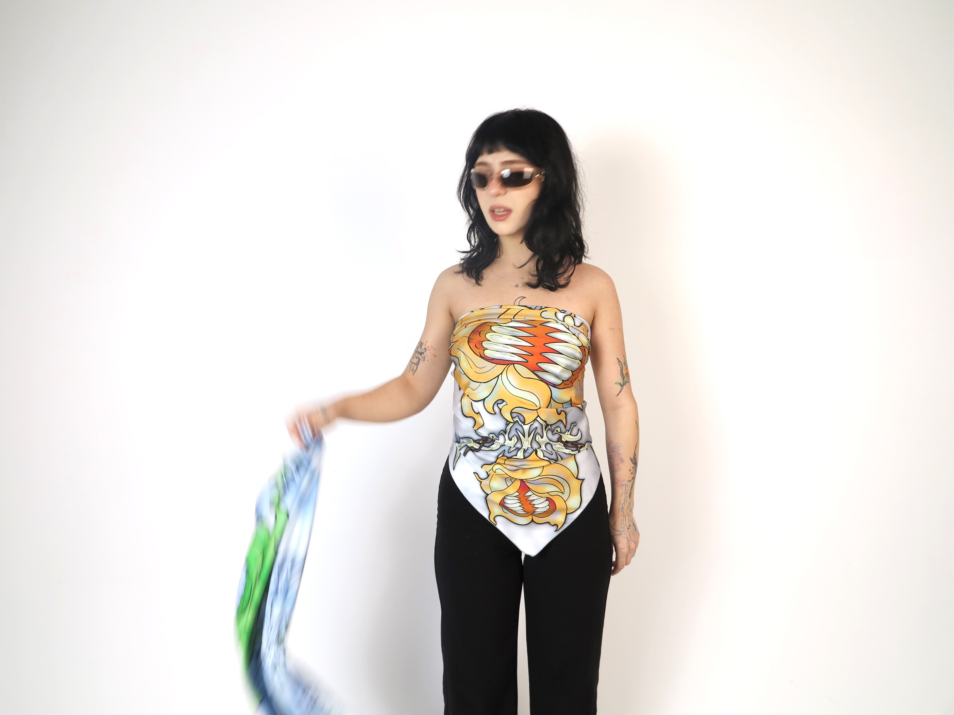 PetalPixie Citrus Bloom scarf styled as a top, featuring vibrant floral abstract illustration