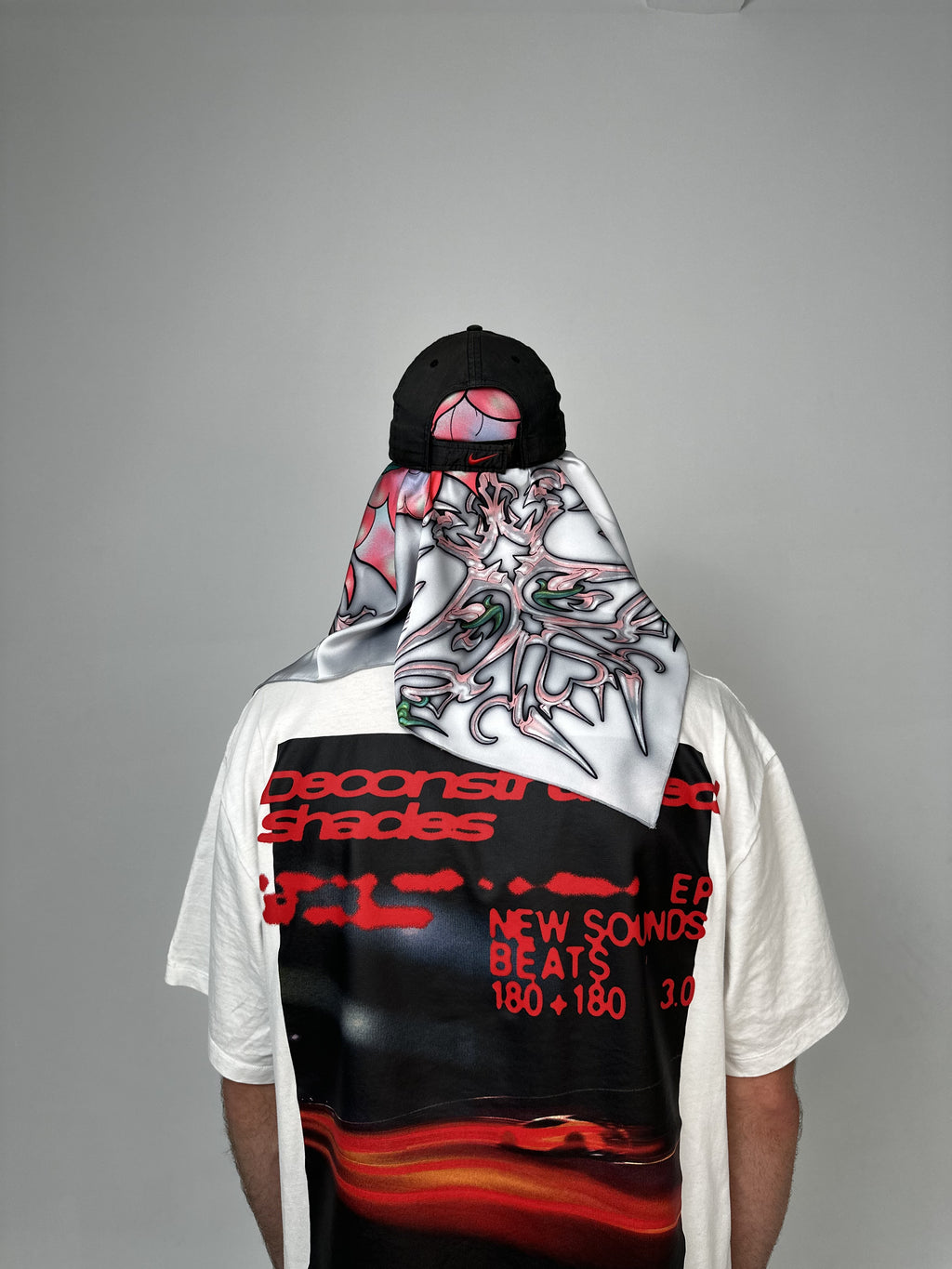 Back view of Crimson Signal artificial silk scarf with bold red and black graphic artwork