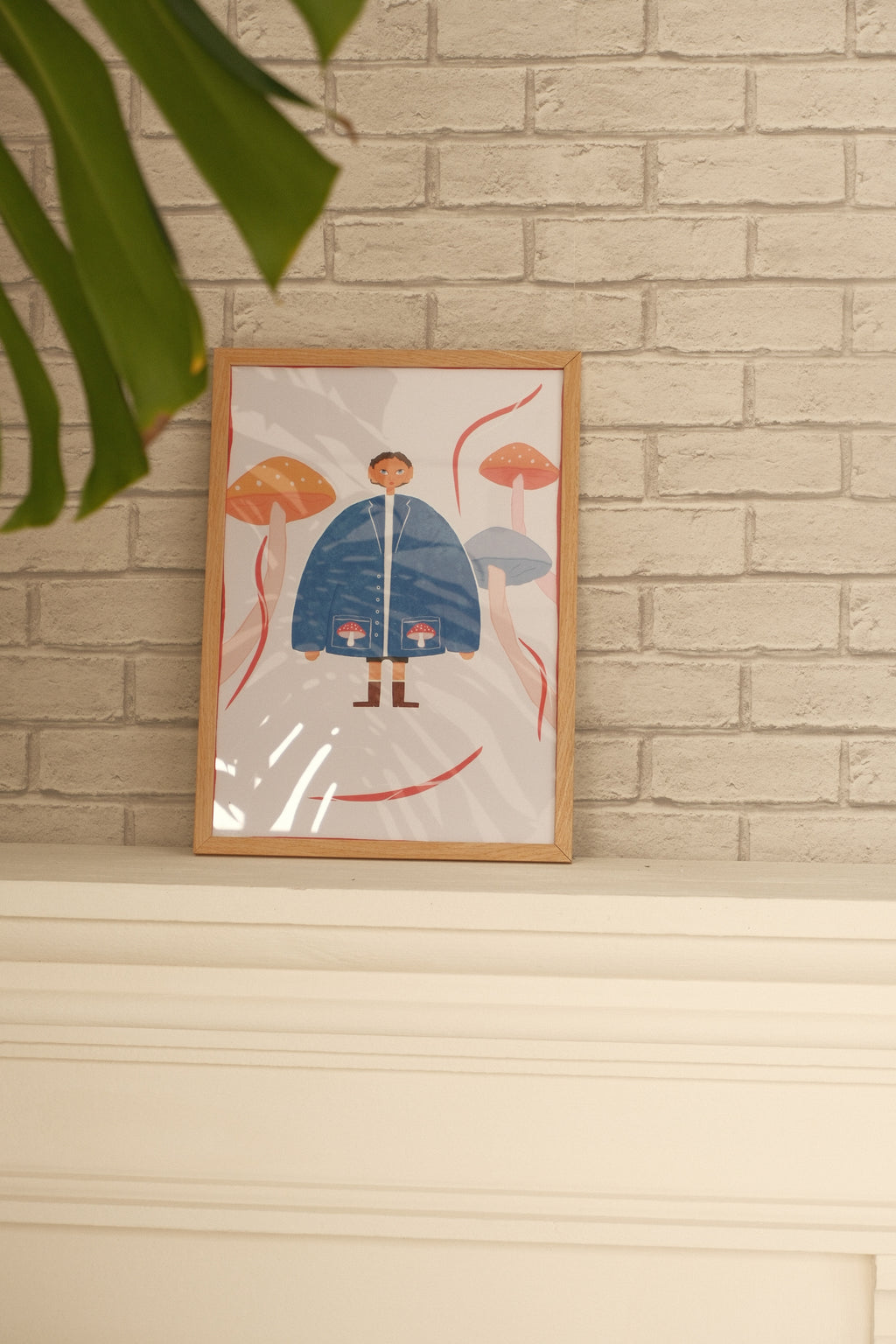 Illustrated art poster Soft Armor showing a figure in a blue coat surrounded by soft, dreamlike elements
