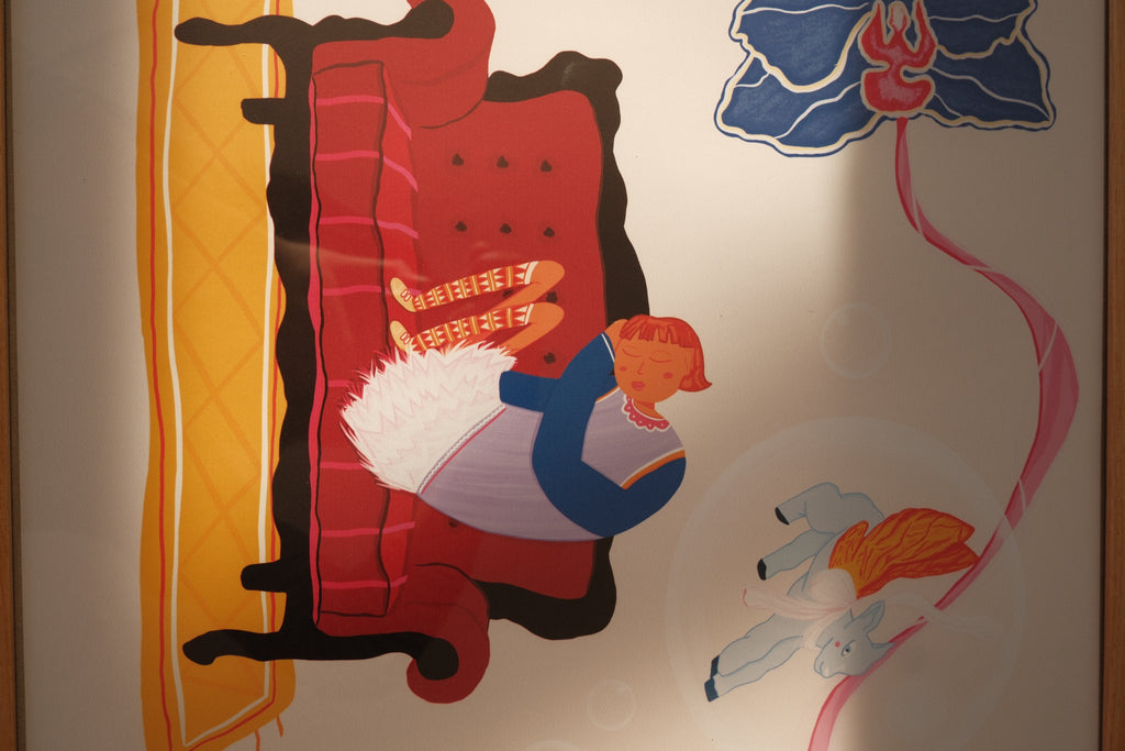 Cartoon-style illustration of a red couch with a white dog and blue cat, and a kite in the background.