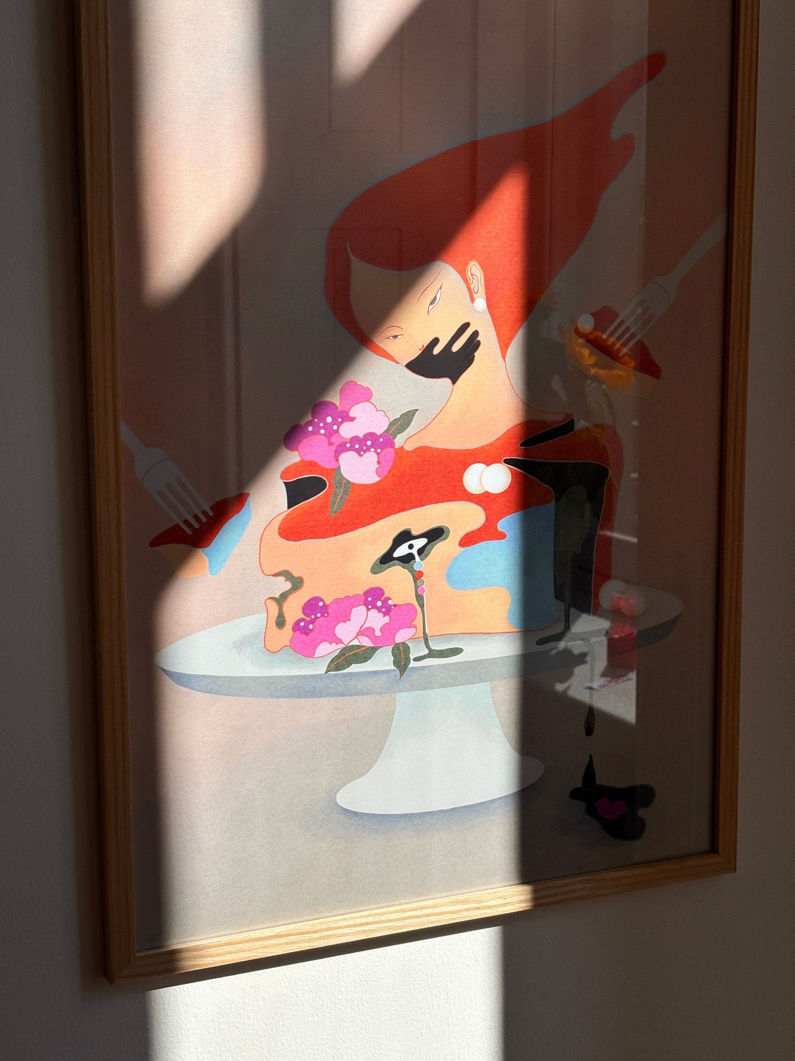 Framed artwork of a stylized figure with flowers and a knife on a wooden surface.