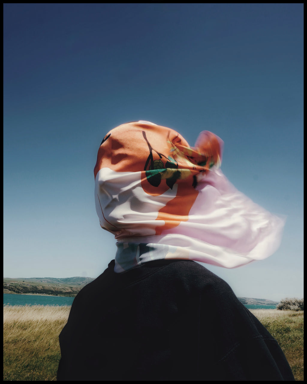 Image 4

Model holding The Illusion of Control scarf outdoors