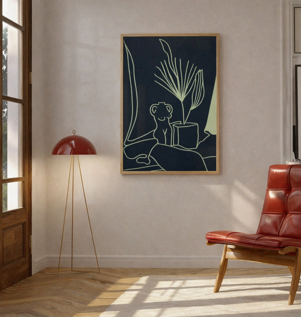 Modern interior with a red chair, floor lamp, and abstract art on the wall.