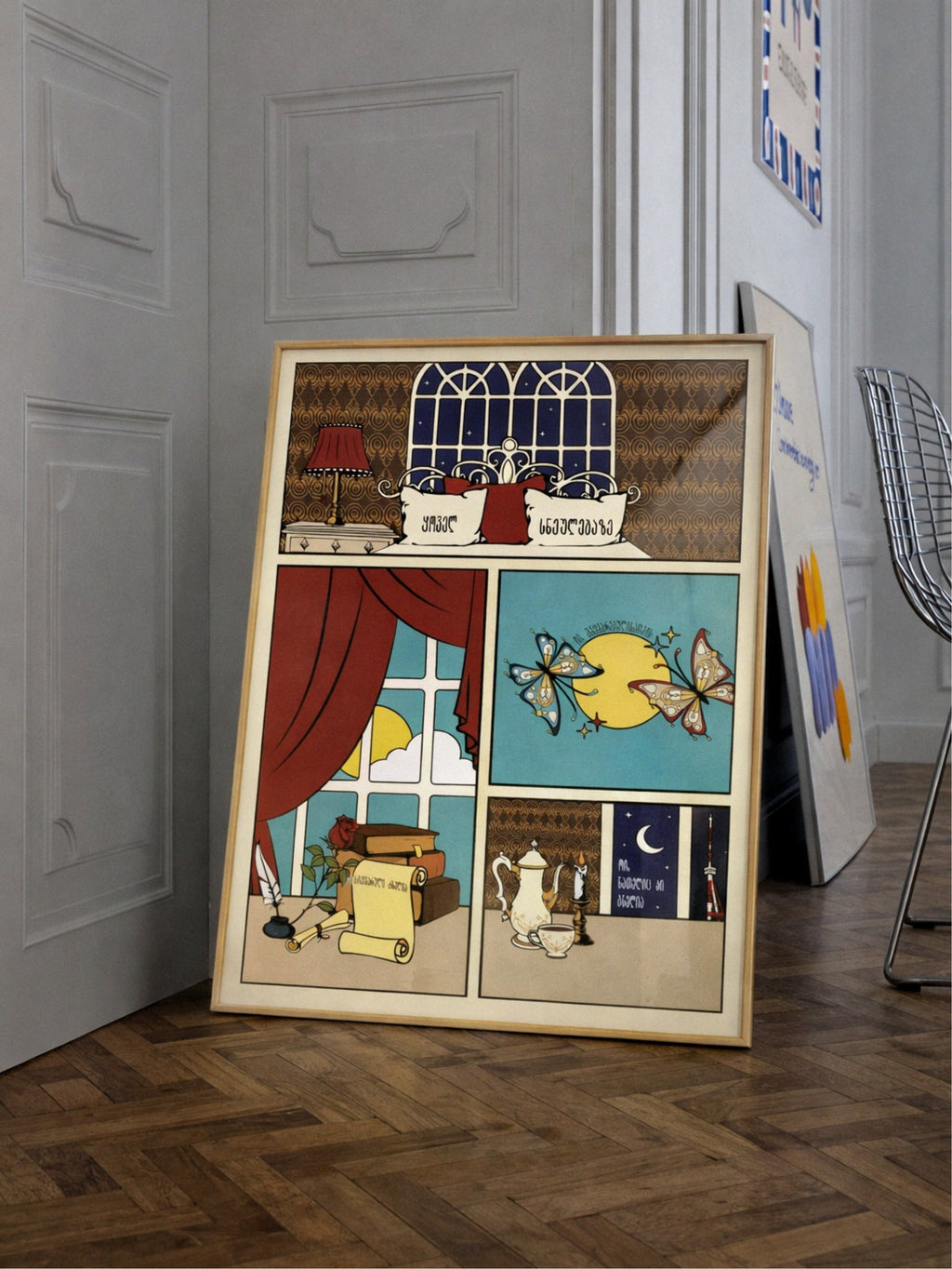 Decorative wall art with illustrations of rooms and objects on a wooden floor.