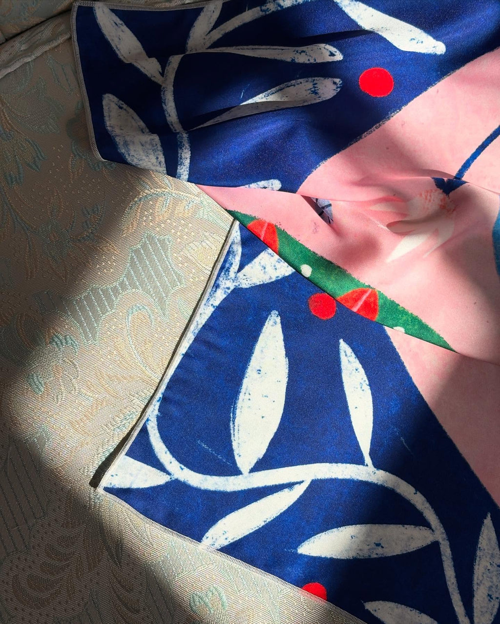 Printed scarf featuring Cancer zodiac artwork in vivid colors, detail