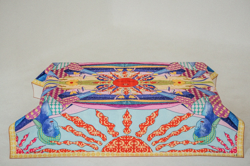 Colorful tablecloth with geometric pattern on a plain background