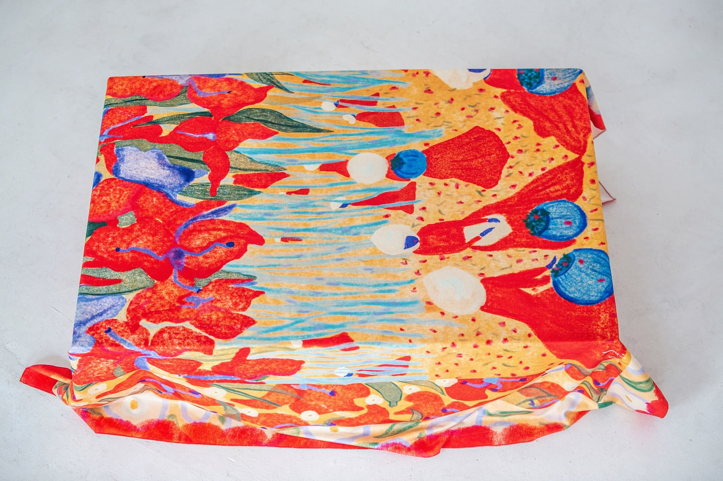 Spring Forest tablecloth styled on a table with bright, expressive design