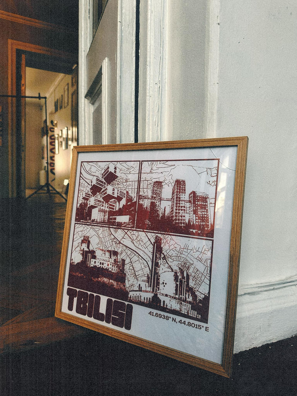 Framed “Tbilisi’s Architecture” poster by Lasha Lezhava x DAE displayed on a wall, inspired by Tbilisi’s balconies and buildings