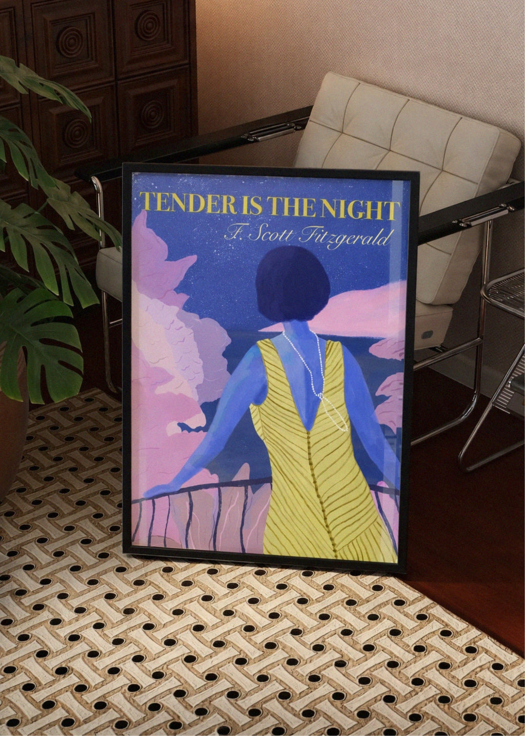 Framed book poster of 'Tender is the Night' by F. Scott Fitzgerald on a textured surface.