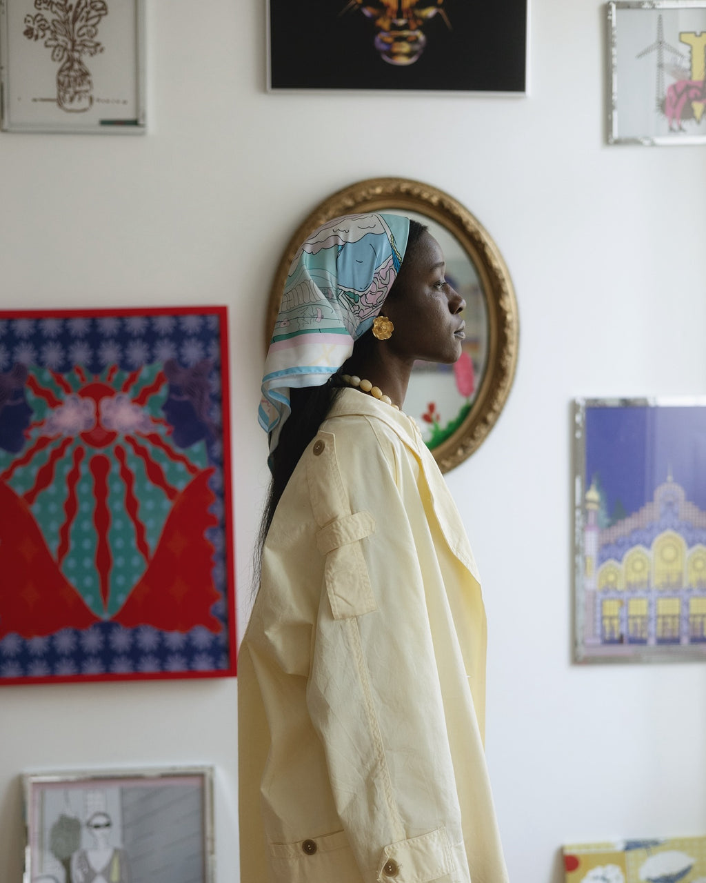 Model wearing Virgo zodiac illustrated scarf in gentle pastel tones